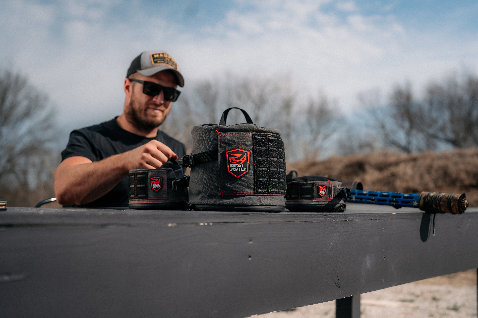 Athlete preparing range gear and shooting bags
